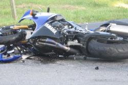 damaged motorcycle in road