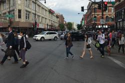 pedestrians cross unmarked intersection