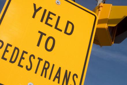 yield to pedestrians sign